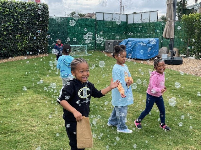 Fun with bubbles at outside classroom.jpg